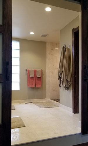 photo into bathroom with white tile floor