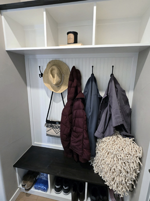 photo of mudroom cubbies bench and hooks
